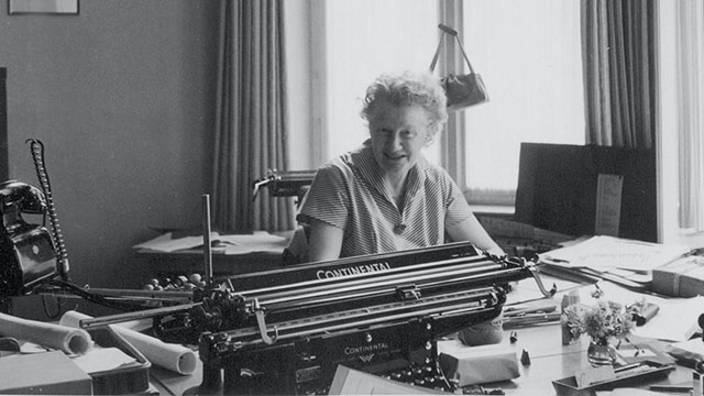 Historical image of a woman working on a typewriter